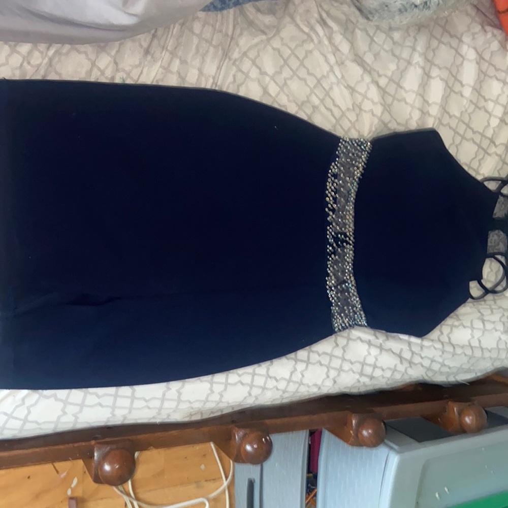 navy blue dress. size 7/8. Bought from the winner, little slit on side.